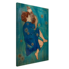 Load image into Gallery viewer, Simba on Canvas – canvas print of a woman holding her cat by Mehlika Tanriverdi, resting together in quiet tenderness on a blue background with blossoms