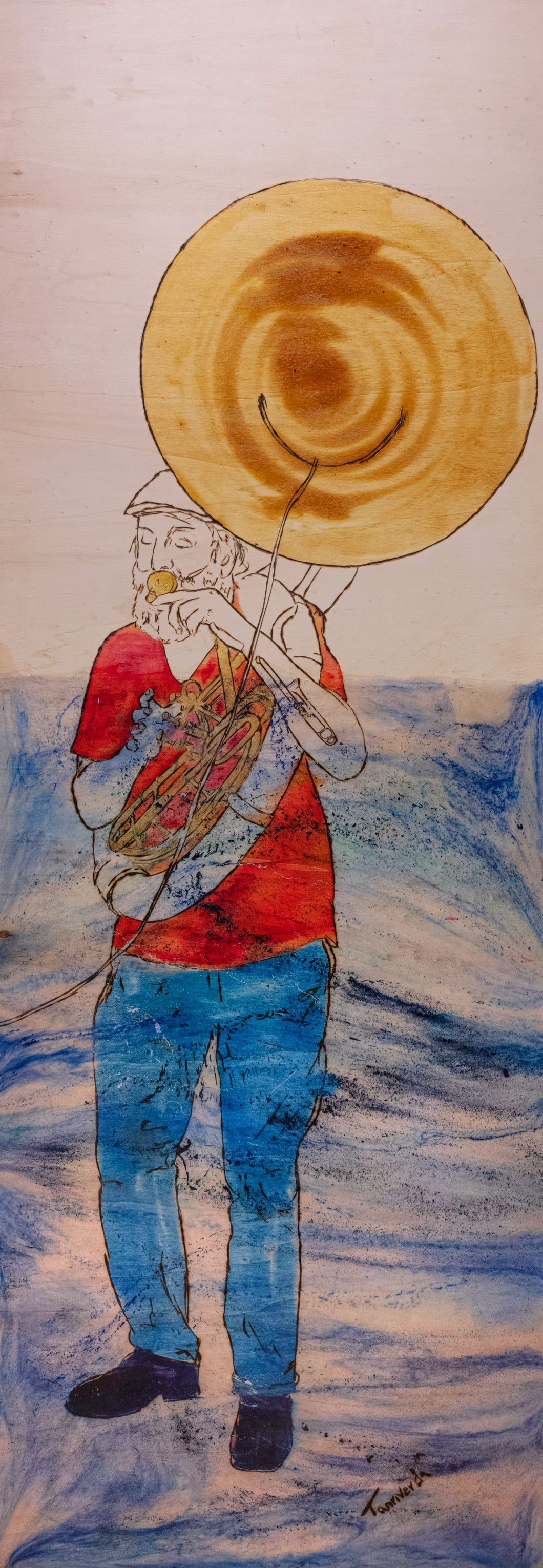Soulfood – original artwork on wood by Mehlika Tanriverdi, showing a man with a golden sousaphone, dressed in red and blue, standing in flowing waves of sound, symbolizing rhythm, joy, and the pulse of life.